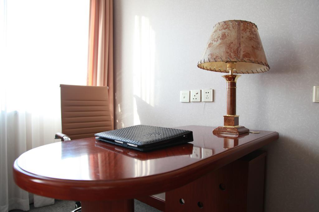 New Gloria Plaza Garden Hotel Cáp Nhĩ Tân Phòng bức ảnh