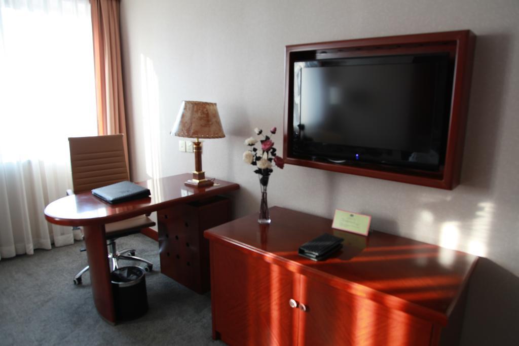 New Gloria Plaza Garden Hotel Cáp Nhĩ Tân Phòng bức ảnh