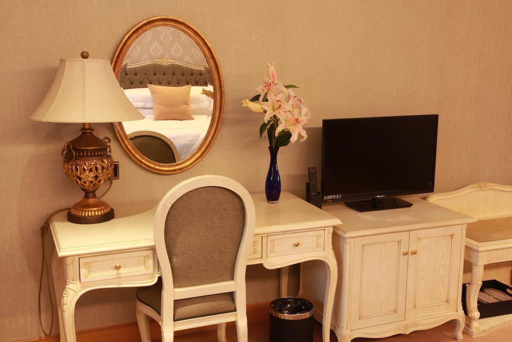 New Gloria Plaza Garden Hotel Cáp Nhĩ Tân Phòng bức ảnh