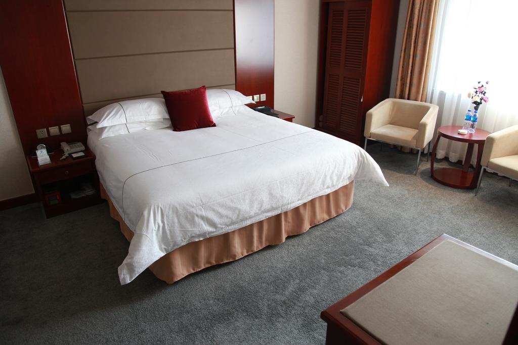 New Gloria Plaza Garden Hotel Cáp Nhĩ Tân Phòng bức ảnh